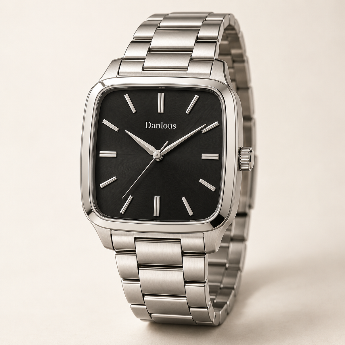 Danlous Monaco, square silver-tone case with rounded corners, black dial, baton markers and silver-tone link bracelet, main studio view